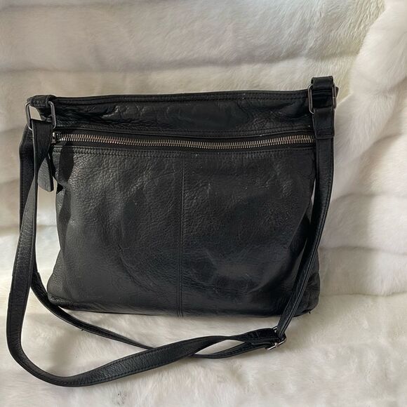Margot black leather shoulder/Crossbody bag with rustic hardwares.